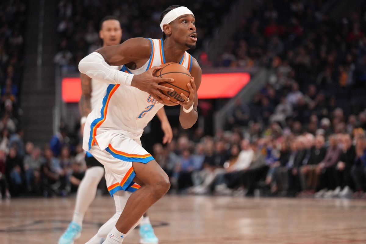 Jan 29, 2025; San Francisco, California, USA; Oklahoma City Thunder guard Shai Gilgeous-Alexander (2) drives to the hoop against the Golden State Warriors in the second quarter at the Chase Center. Mandatory Credit: Cary Edmondson-Imagn Images