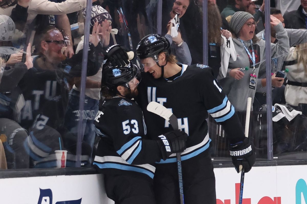 Jan 29, 2025; Salt Lake City, Utah, USA; Utah Hockey Club left wing Michael Carcone (53) celebrates scoring a goal against the Pittsburgh Penguins with center Nick Bjugstad (17) during the second period at Delta Center. Mandatory Credit: Rob Gray-Imagn Images