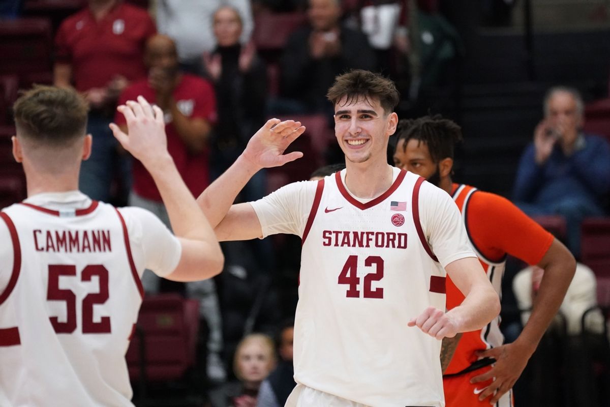 Jan 29, 2025; Stanford, California, USA;  Stanford Cardinal forward Maxime Raynaud (42) celebrates with forward Aidan Cammann (52) at the end of the game against the Syracuse Orange at Maples Pavilion. Mandatory Credit: David Gonzales-Imagn Images