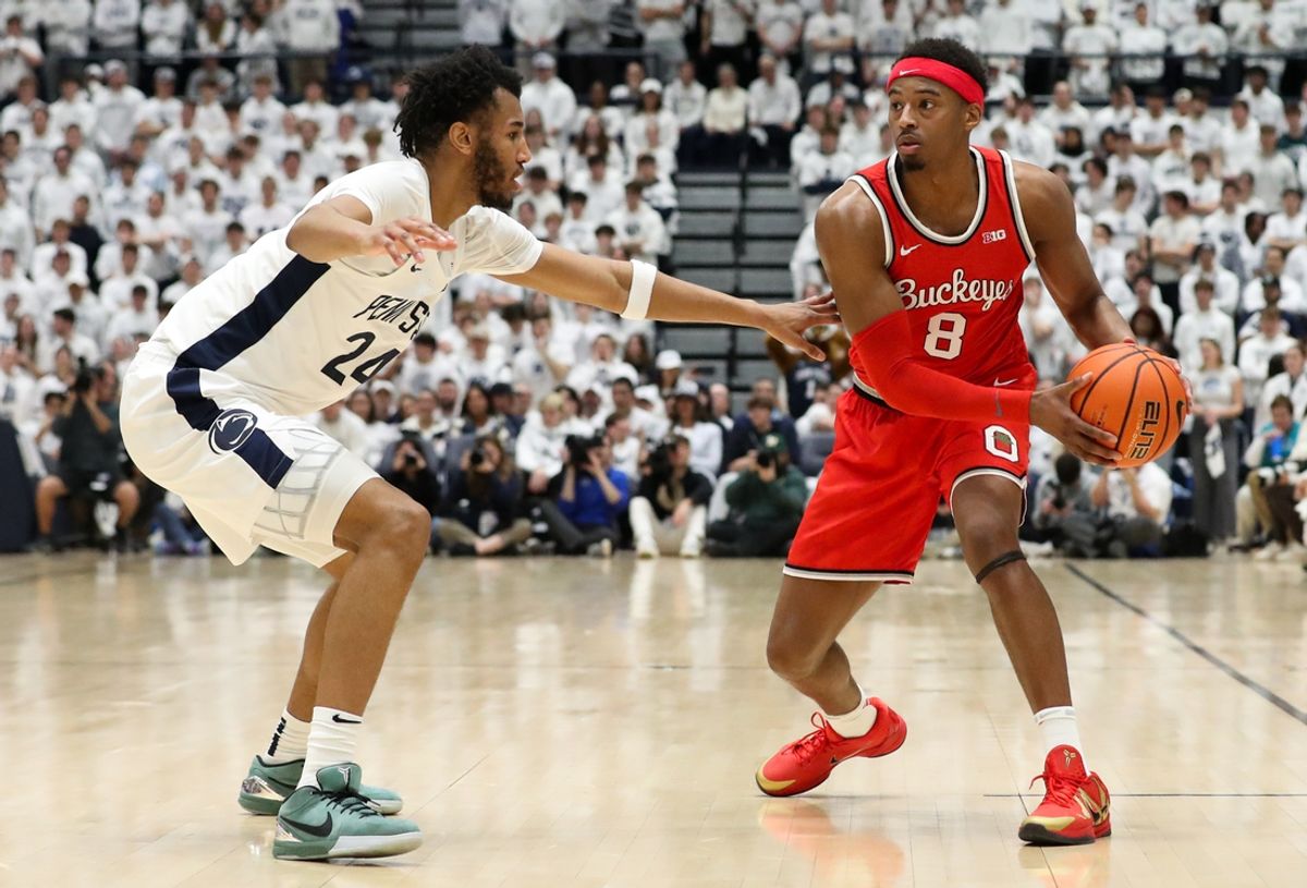 Jan 30, 2025; University Park, Pennsylvania, USA; Ohio State Buckeyes guard Micah Parrish (8) holds the ball as Penn State Nittany Lions forward Zach Hicks (24) defends during the first half at Rec Hall. Mandatory Credit: Matthew O'Haren-Imagn Images