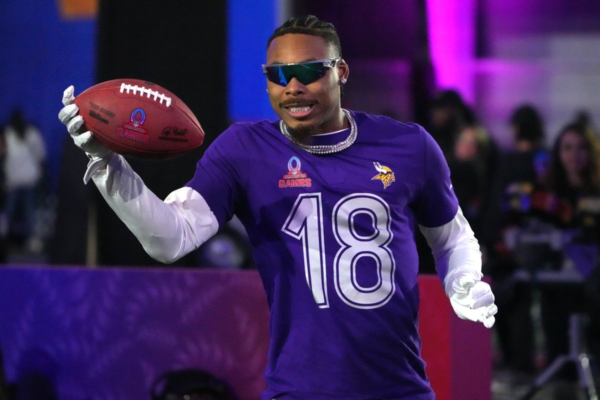 Jan 30, 2025; Orlando, FL, USA; NFC wide receiver Justin Jefferson of the Minnesota Vikings (18) catches the ball during the Satisfying Catch event at the Pro Bowl Skills Challenge at Nicholson Fieldhouse. Mandatory Credit: Kirby Lee-Imagn Images