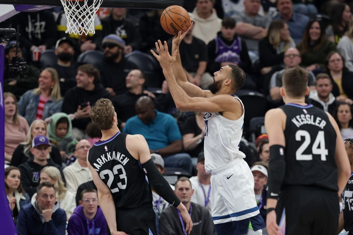 Jan 30, 2025; Salt Lake City, Utah, USA;  Minnesota Timberwolves center Rudy Gobert (27) shoots the ball during the first quarter at Delta Center. Mandatory Credit: Chris Nicoll-Imagn Images