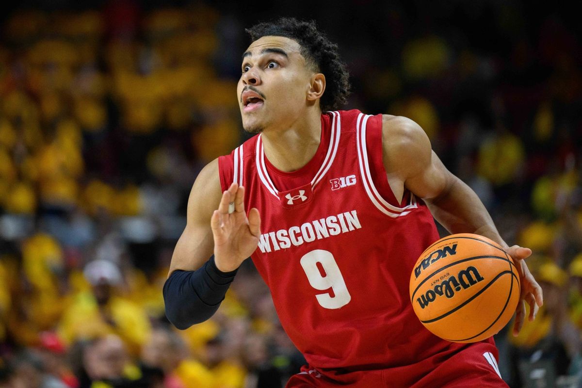 Jan 29, 2025; College Park, Maryland, USA; Wisconsin Badgers guard John Tonje (9) handles the ball during the first half against the Maryland Terrapins at Xfinity Center. Mandatory Credit: Reggie Hildred-Imagn Images