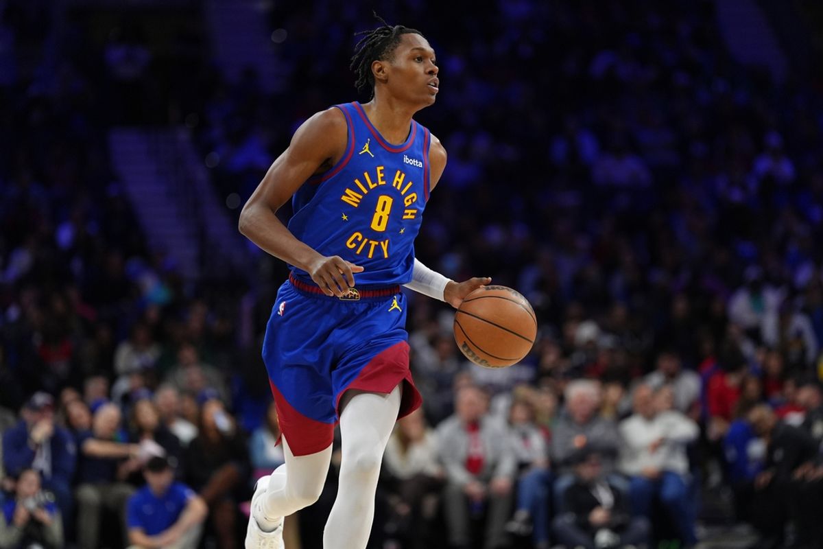 Jan 31, 2025; Philadelphia, Pennsylvania, USA; Denver Nuggets guard Peyton Watson (8) controls the ball against the Philadelphia 76ers in the second quarter at Wells Fargo Center. Mandatory Credit: Kyle Ross-Imagn Images