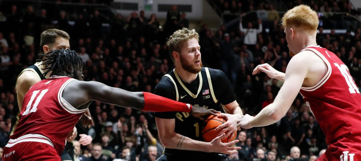 Indiana Hoosiers center Oumar Ballo (11) and Indiana Hoosiers forward Luke Goode (10) defend Purdue Boilermakers forward Caleb Furst (1) Friday, Jan. 31, 2025, during the NCAA men’s basketball game at Mackey Arena in West Lafayette, Ind. Purdue Boilermakers won 81-76.