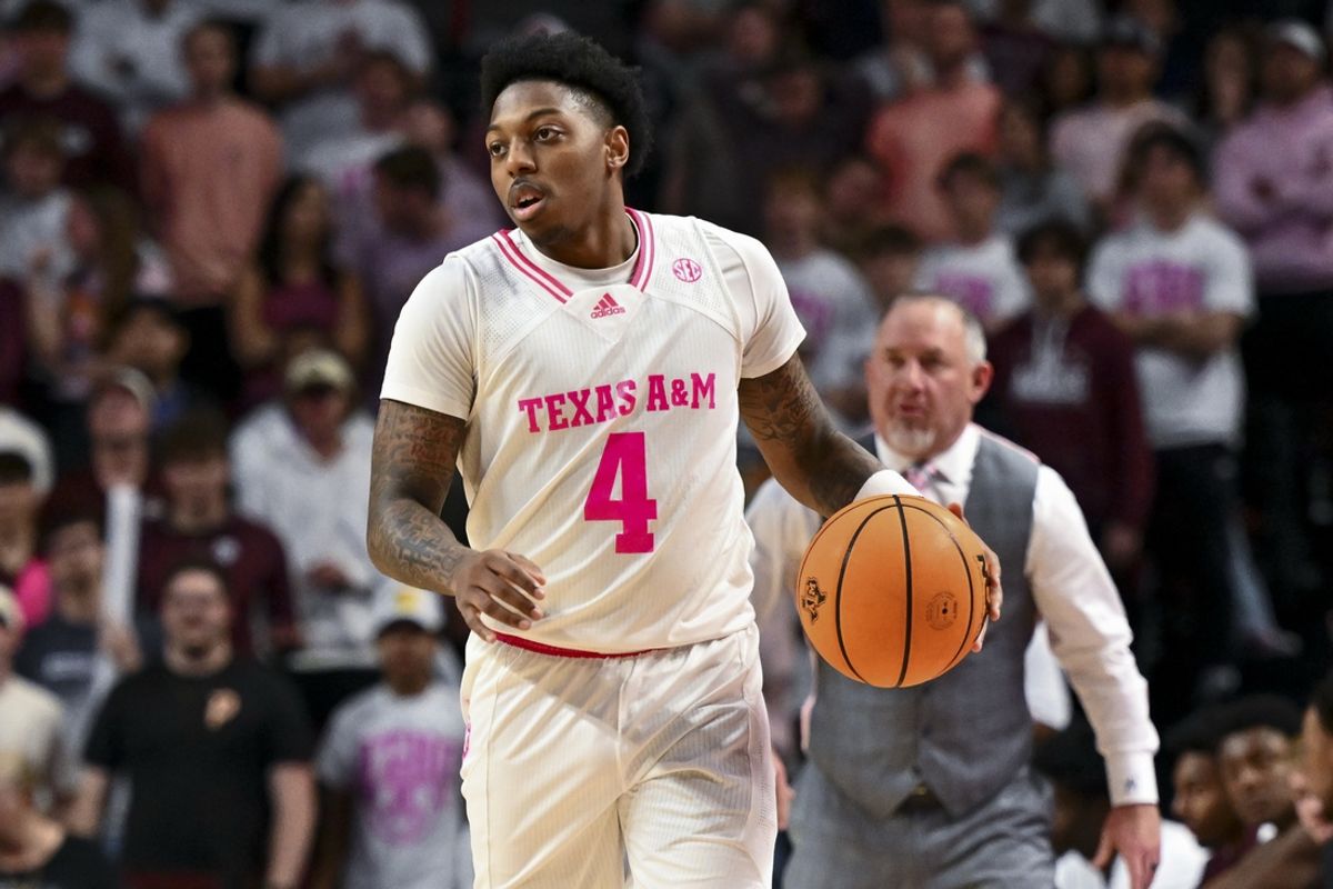Jan 28, 2025; College Station, Texas, USA; Texas A&M Aggies guard Wade Taylor IV (4) brings the ball down court during the first half against the Oklahoma Sooners at Reed Arena. The Aggies defeated the Sooners 75-68. Mandatory Credit: Maria Lysaker-Imagn Images