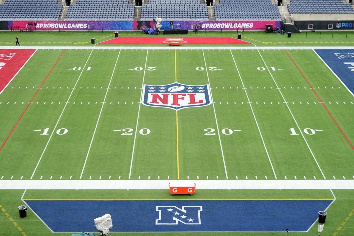 Feb 1, 2025; Orlando, FL, USA; An overall view of the NFL shield logo at midfield on the Camping World Stadium flag football field. Mandatory Credit: Kirby Lee-Imagn Images