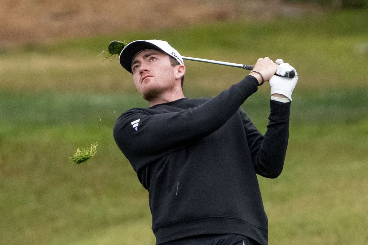February 1, 2025; Pebble Beach, California, USA; Nick Dunlap hits his chip shot on the second hole during the third round of the AT&T Pebble Beach Pro-Am golf tournament at Pebble Beach Golf Links. Mandatory Credit: Kyle Terada-Imagn Images