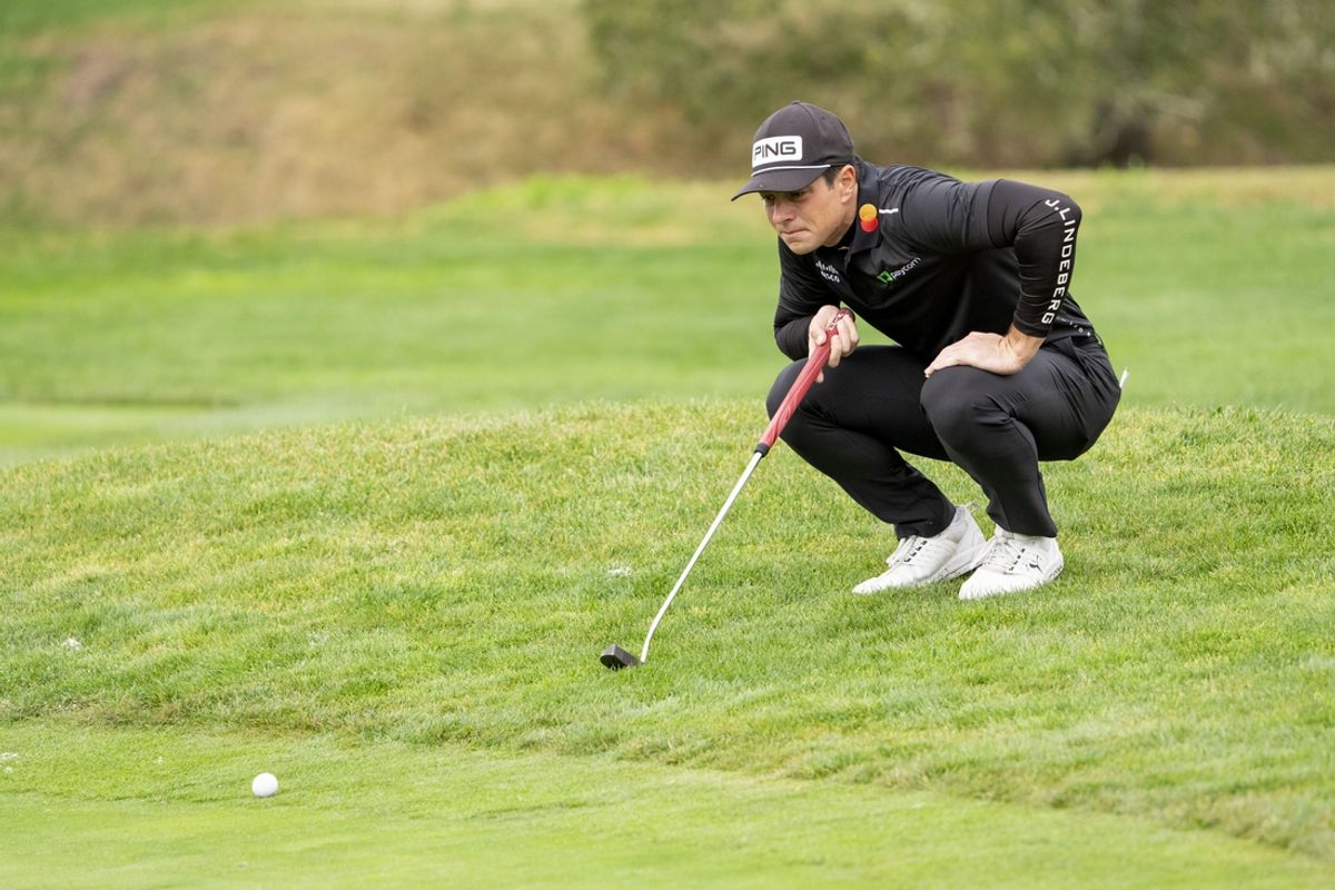 February 1, 2025; Pebble Beach, California, USA; Viktor Hovland lines up his putt on the second hole during the third round of the AT&T Pebble Beach Pro-Am golf tournament at Pebble Beach Golf Links. Mandatory Credit: Kyle Terada-Imagn Images