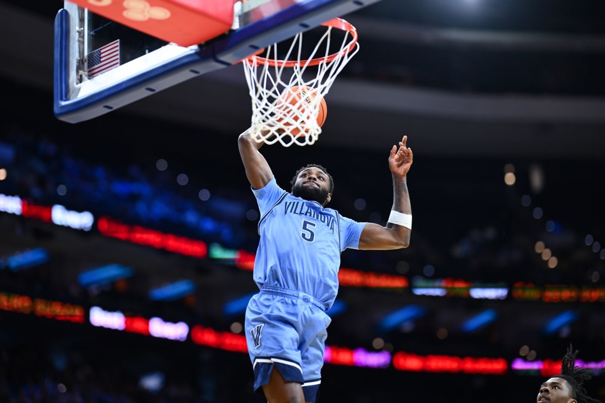 Feb 1, 2025; Philadelphia, Pennsylvania, USA; Villanova Wildcats guard Wooga Poplar (5) dunks against the Creighton Bluejays in the second half at Wells Fargo Center. Mandatory Credit: Kyle Ross-Imagn Images