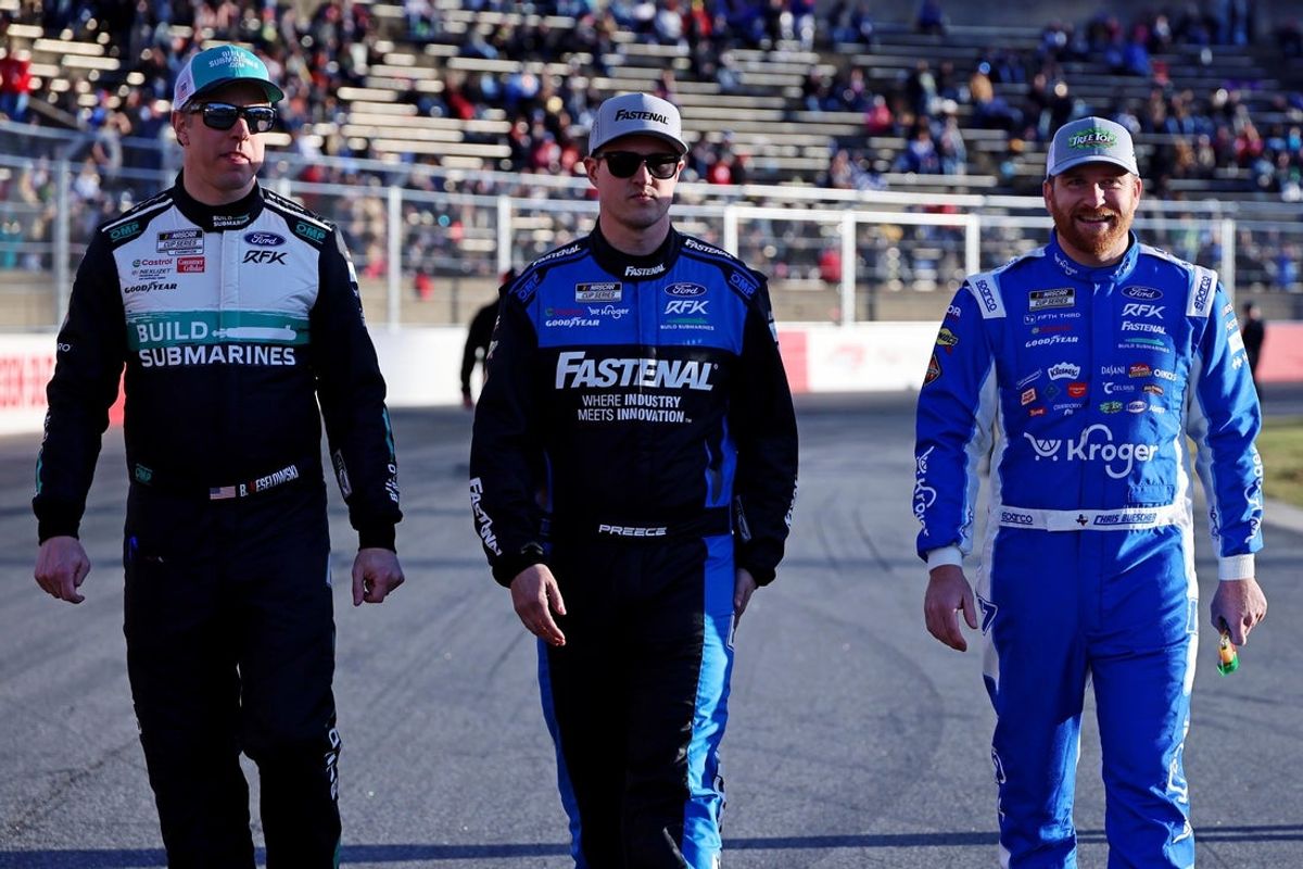 Feb 1, 2025; WInston-Salem, North Carolina, USA; RFK Racing drivers Brad Keselowski (6), Ryan Preece (60) and Chris Buescher (17) walk the track before practice for the Clash at Bowman Gray at Bowman Gray Stadium. Mandatory Credit: Peter Casey-Imagn Images