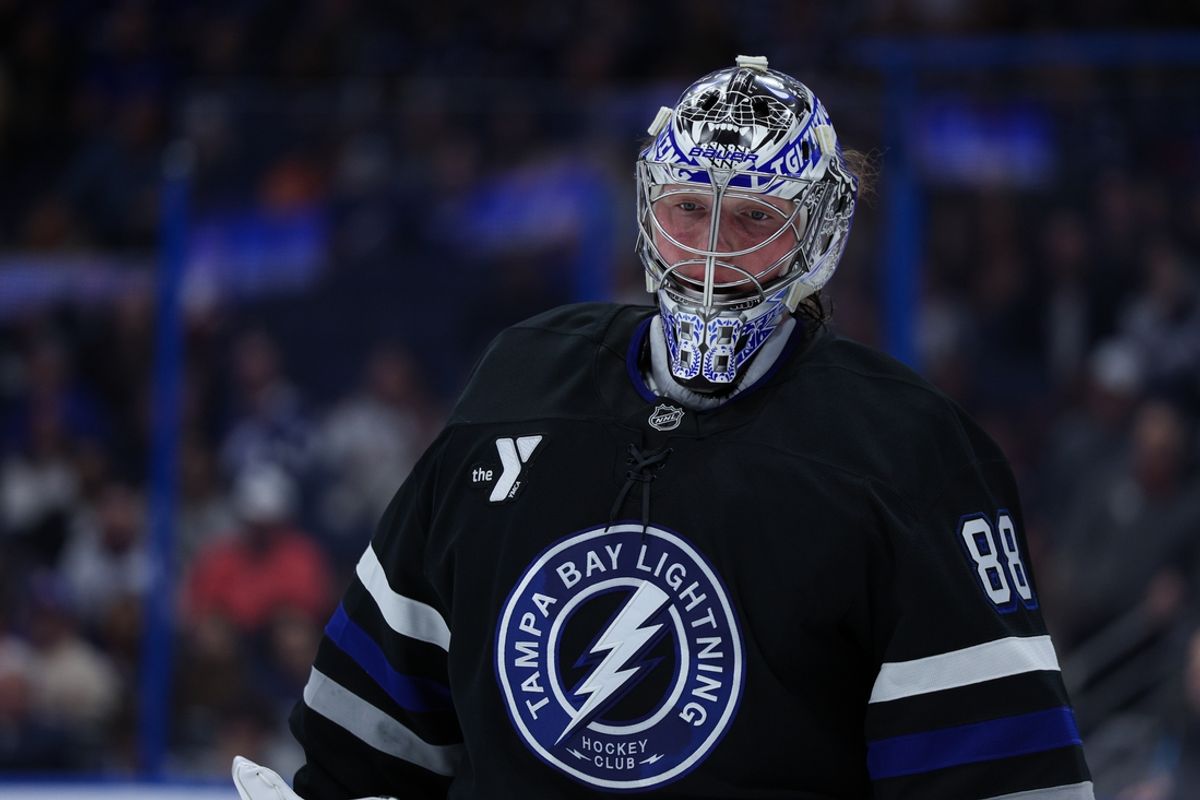 Feb 1, 2025; Tampa, Florida, USA; Tampa Bay Lightning goaltender Andrei Vasilevskiy (88) looks on against the New York Islanders in the first period at Amalie Arena. Mandatory Credit: Nathan Ray Seebeck-Imagn Images