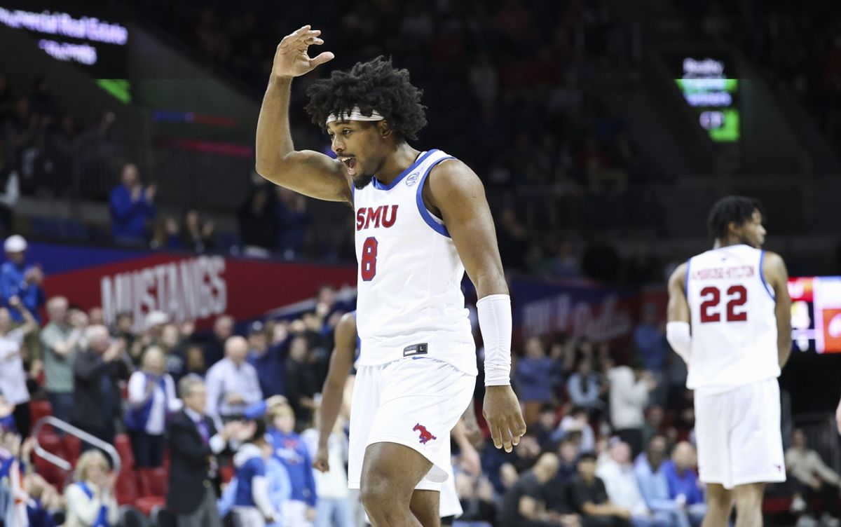 Feb 1, 2025; Dallas, Texas, USA;  Southern Methodist Mustangs guard Kario Oquendo (8) celebrates during the second half against the Stanford Cardinal at Moody Coliseum. Mandatory Credit: Kevin Jairaj-Imagn Images