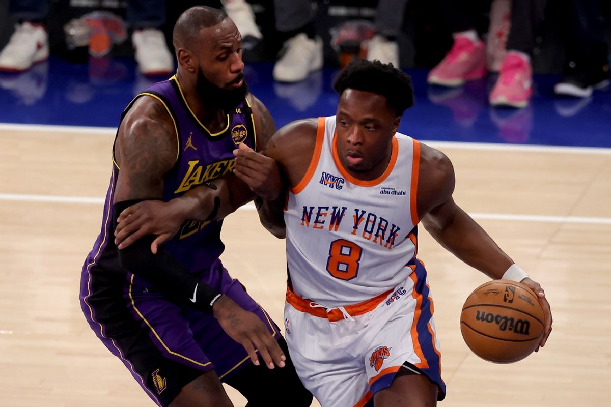 Feb 1, 2025; New York, New York, USA; New York Knicks forward OG Anunoby (8) controls the ball against Los Angeles Lakers forward LeBron James (23) during the first quarter at Madison Square Garden. Mandatory Credit: Brad Penner-Imagn Images