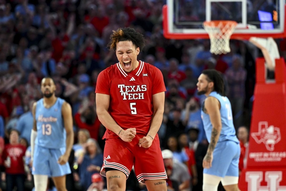 Feb 1, 2025; Houston, Texas, USA; Texas Tech Red Raiders forward Darrion Williams (5) reacts after shooting a three point basket to tie the game with seconds left on the clock against the Houston Cougars at Fertitta Center. Mandatory Credit: Maria Lysaker-Imagn Images