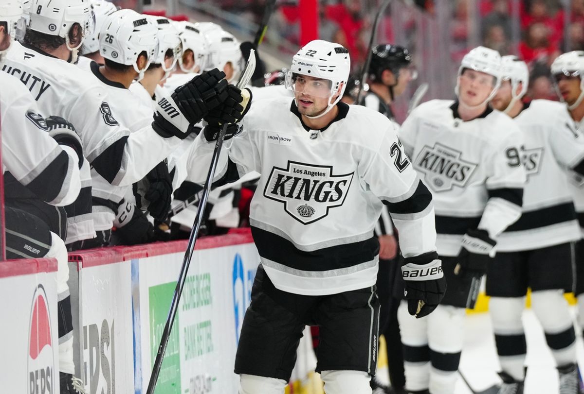 Feb 1, 2025; Raleigh, North Carolina, USA;  Los Angeles Kings left wing Kevin Fiala (22) celebrates his goal against the Carolina Hurricanes during the third period at Lenovo Center. Mandatory Credit: James Guillory-Imagn Images