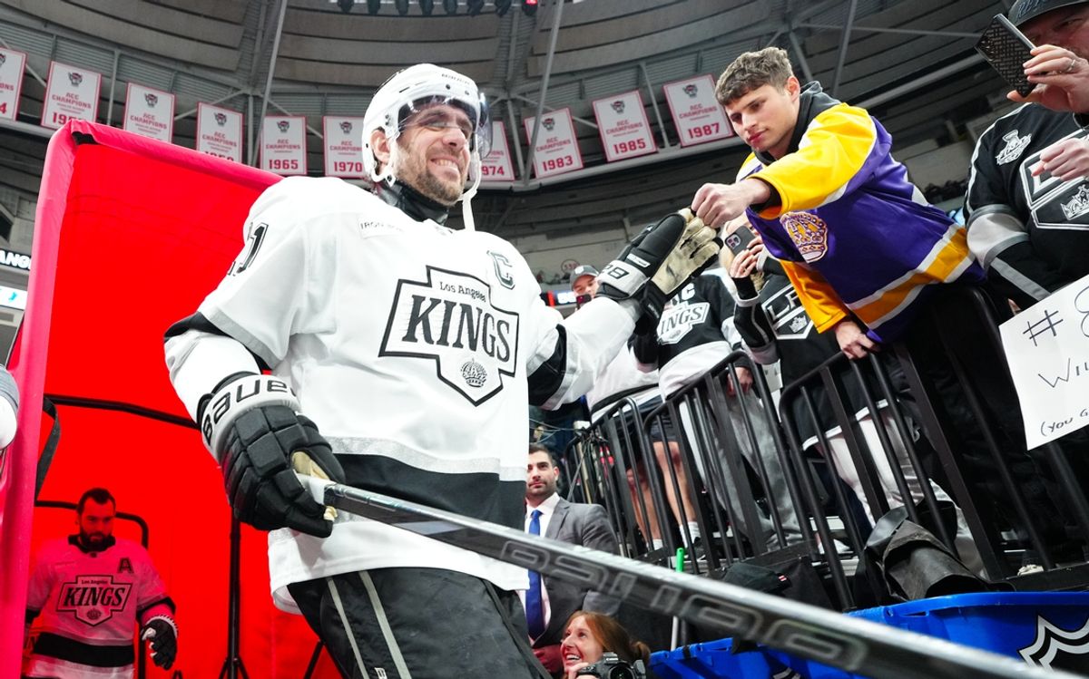 Feb 1, 2025; Raleigh, North Carolina, USA;  Los Angeles Kings center Anze Kopitar (11) goes past the fans on his way to the warmups before the game against the Carolina Hurricanes at Lenovo Center. Mandatory Credit: James Guillory-Imagn Images