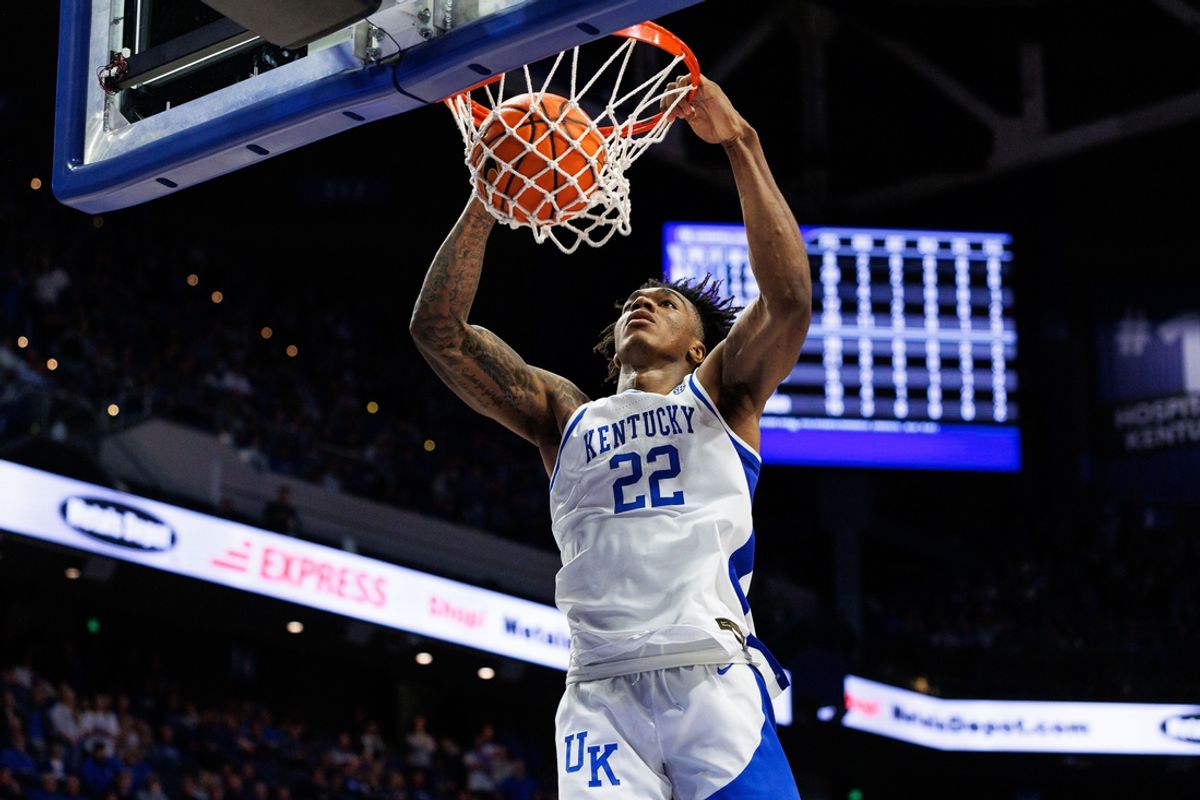 Feb 1, 2025; Lexington, Kentucky, USA; Kentucky Wildcats center Amari Williams (22) dunks the ball during the second half against the Arkansas Razorbacks at Rupp Arena at Central Bank Center. Mandatory Credit: Jordan Prather-Imagn Images