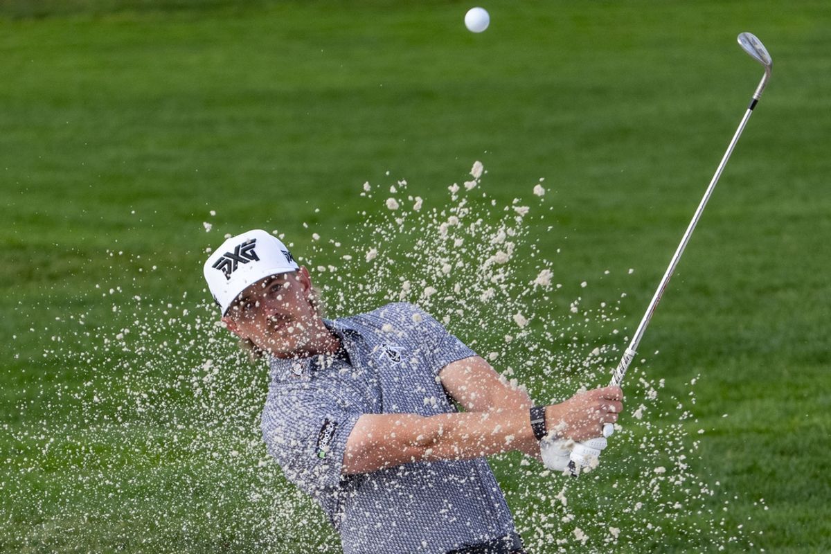 February 2, 2025; Pebble Beach, California, USA; Jake Knapp hits his bunker shot on the second hole during the final round of the AT&T Pebble Beach Pro-Am golf tournament at Pebble Beach Golf Links. Mandatory Credit: Kyle Terada-Imagn Images