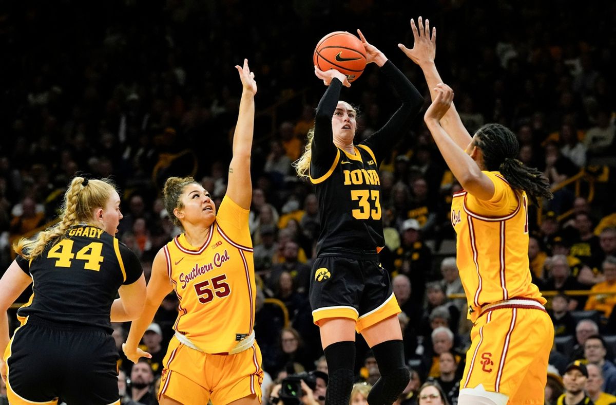Iowa Hawkeyes guard Lucy Olsen (33) shoots against the USC Trojans during a Big Ten women’s basketball game Sunday, Feb. 2, 2025 at Carver-Hawkeye Arena in Iowa City, Iowa.