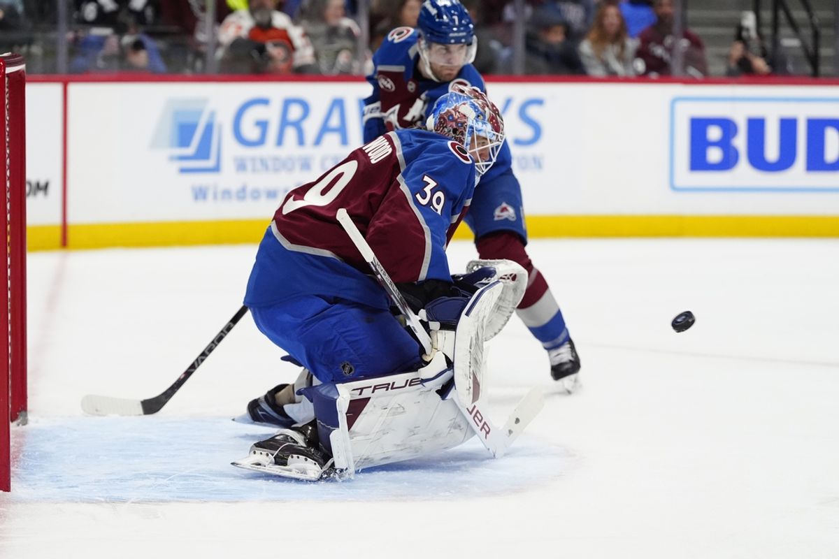 Feb 2, 2025; Denver, Colorado, USA; Colorado Avalanche goaltender Mackenzie Blackwood (39) prepares to make a save in the first period against the Philadelphia Flyers at Ball Arena. Mandatory Credit: Ron Chenoy-Imagn Images