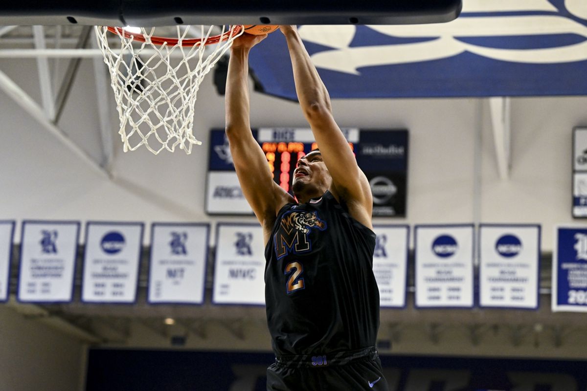 Feb 2, 2025; Houston, Texas, USA; Memphis Tigers forward Nicholas Jourdain (2) dunks the ball during the first half against the Rice Owls at Tudor Fieldhouse. Mandatory Credit: Maria Lysaker-Imagn Images