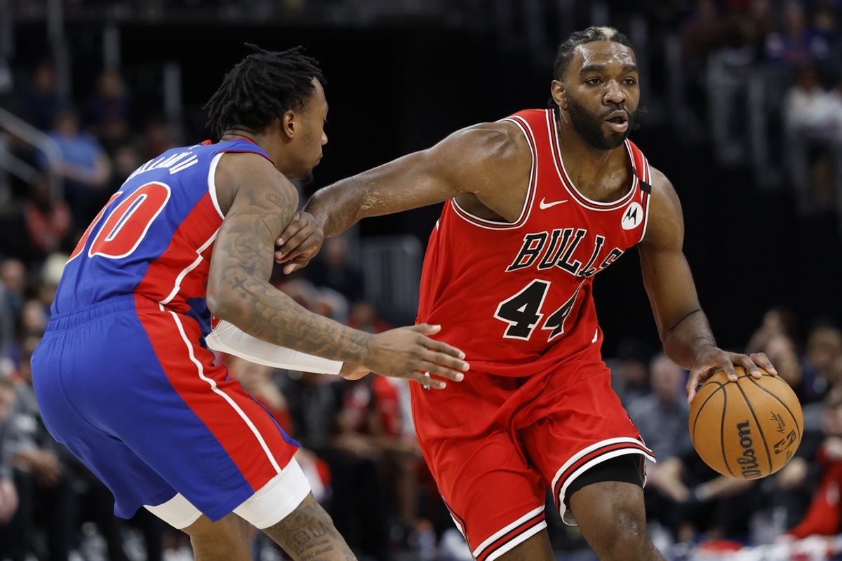 Feb 2, 2025; Detroit, Michigan, USA; Chicago Bulls forward Patrick Williams (44) dribbles defended by Detroit Pistons forward Ronald Holland II (00) in the first half at Little Caesars Arena. Mandatory Credit: Rick Osentoski-Imagn Images