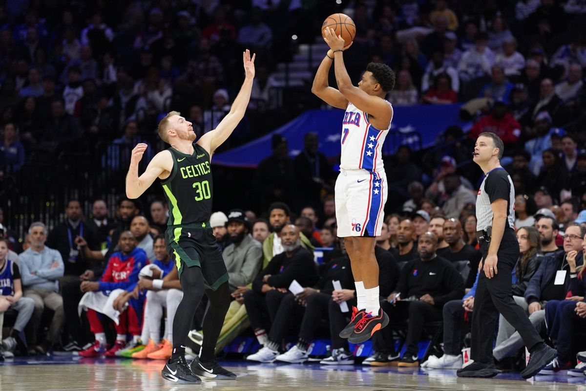 Feb 2, 2025; Philadelphia, Pennsylvania, USA; Philadelphia 76ers guard Kyle Lowry (7) shoots the ball against Boston Celtics forward Sam Hauser (30) in the second quarter at Wells Fargo Center. Mandatory Credit: Kyle Ross-Imagn Images