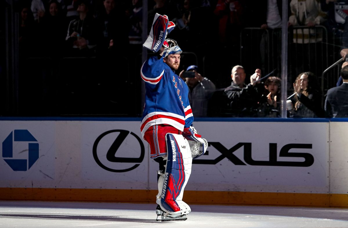 Feb 2, 2025; New York, New York, USA; New York Rangers goalie Jonathan Quick (32) celebrates after his 400th career win following a 4-2 victory against the Vegas Golden Knights at Madison Square Garden. Mandatory Credit: Danny Wild-Imagn Images