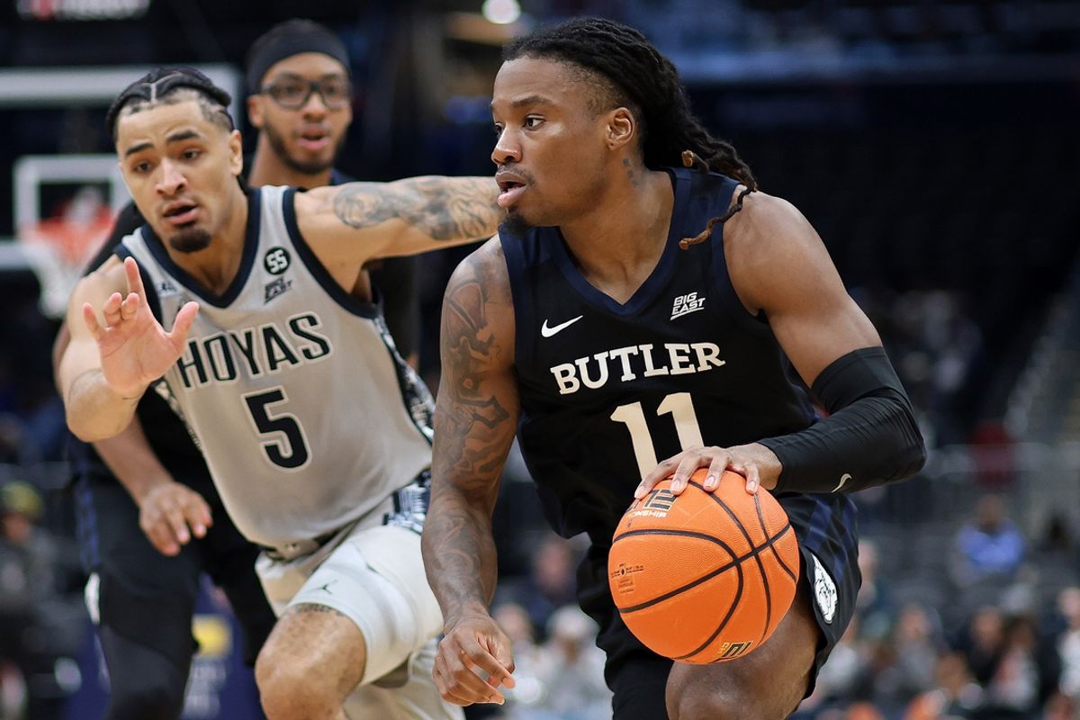 Jan 31, 2025; Washington, District of Columbia, USA; Butler Bulldogs forward Jahmyl Telfort (11) drives past Georgetown Hoyas guard Micah Peavy (5) during the second half at Capital One Arena. Mandatory Credit: Daniel Kucin Jr.-Imagn Images