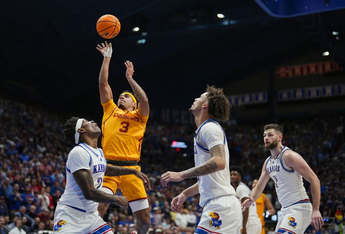 Feb 3, 2025; Lawrence, Kansas, USA; Kansas Jayhawks guard Dajuan Harris Jr. (3) shoots against the Kansas Jayhawks during the first half at Allen Fieldhouse. Mandatory Credit: Jay Biggerstaff-Imagn Images