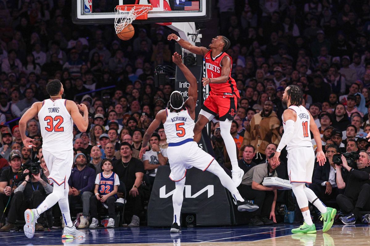 Feb 3, 2025; New York, New York, USA; Houston Rockets forward Amen Thompson (1) dunks the ball against New York Knicks forward Precious Achiuwa (5) during the second half at Madison Square Garden. Mandatory Credit: Vincent Carchietta-Imagn Images