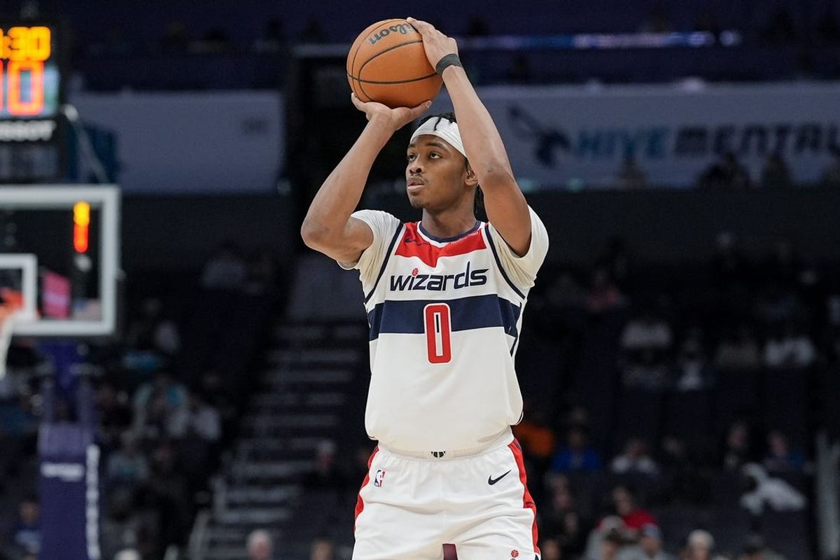 Feb 3, 2025; Charlotte, North Carolina, USA; Washington Wizards guard Bilal Coulibaly (0) shoots a jumper during the second half against the Charlotte Hornets at Spectrum Center. Mandatory Credit: Jim Dedmon-Imagn Images