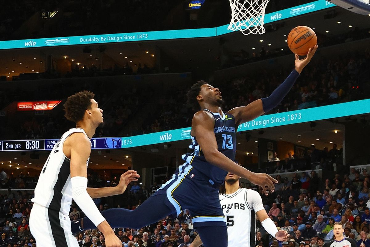 Feb 3, 2025; Memphis, Tennessee, USA; Memphis Grizzlies forward Jaren Jackson Jr. (13) shoots as San Antonio Spurs center Victor Wembanyama (1) defends during the second quarter at FedExForum. Mandatory Credit: Petre Thomas-Imagn Images