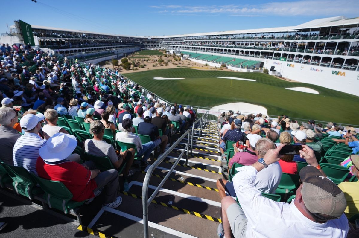 Fans gather to watch a practice round of golf at the 16th hole of the WM Phoenix Open at TPC in Scottsdale on Tuesday, Feb. 4, 2025.