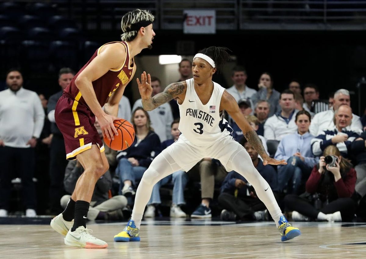 Feb 4, 2025; University Park, Pennsylvania, USA; Penn State Nittany Lions guard Nick Kern Jr (3) defends as Minnesota Golden Gophers forward Dawson Garcia (3) holds the ball during the first half at Bryce Jordan Center. Mandatory Credit: Matthew O'Haren-Imagn Images