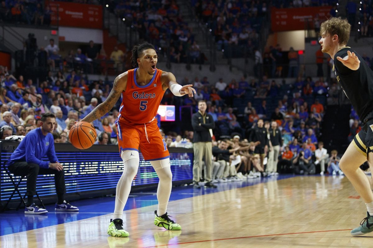 Feb 4, 2025; Gainesville, Florida, USA; Florida Gators guard Will Richer (5) dribbles downcourt against Vanderbilt Commodores during the second half at Exactech Arena at the Stephen C. O'Connell Center. Mandatory Credit: Morgan Tencza-Imagn Images