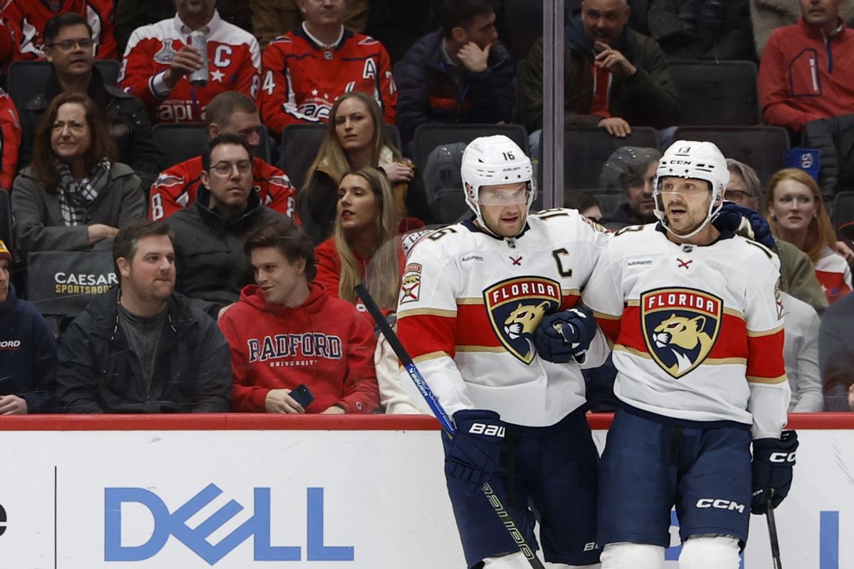 Feb 4, 2025; Washington, District of Columbia, USA; Florida Panthers center Aleksander Barkov (16) celebrates with Panthers center Sam Reinhart (13) after scoring a goal against the Washington Capitals in the second period at Capital One Arena. Mandatory Credit: Geoff Burke-Imagn Images