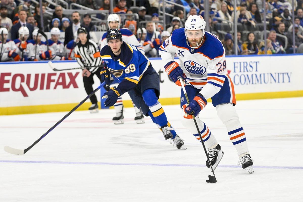 Feb 4, 2025; St. Louis, Missouri, USA;  Edmonton Oilers center Leon Draisaitl (29) controls the puck against the St. Louis Blues during the first period at Enterprise Center. Mandatory Credit: Jeff Curry-Imagn Images