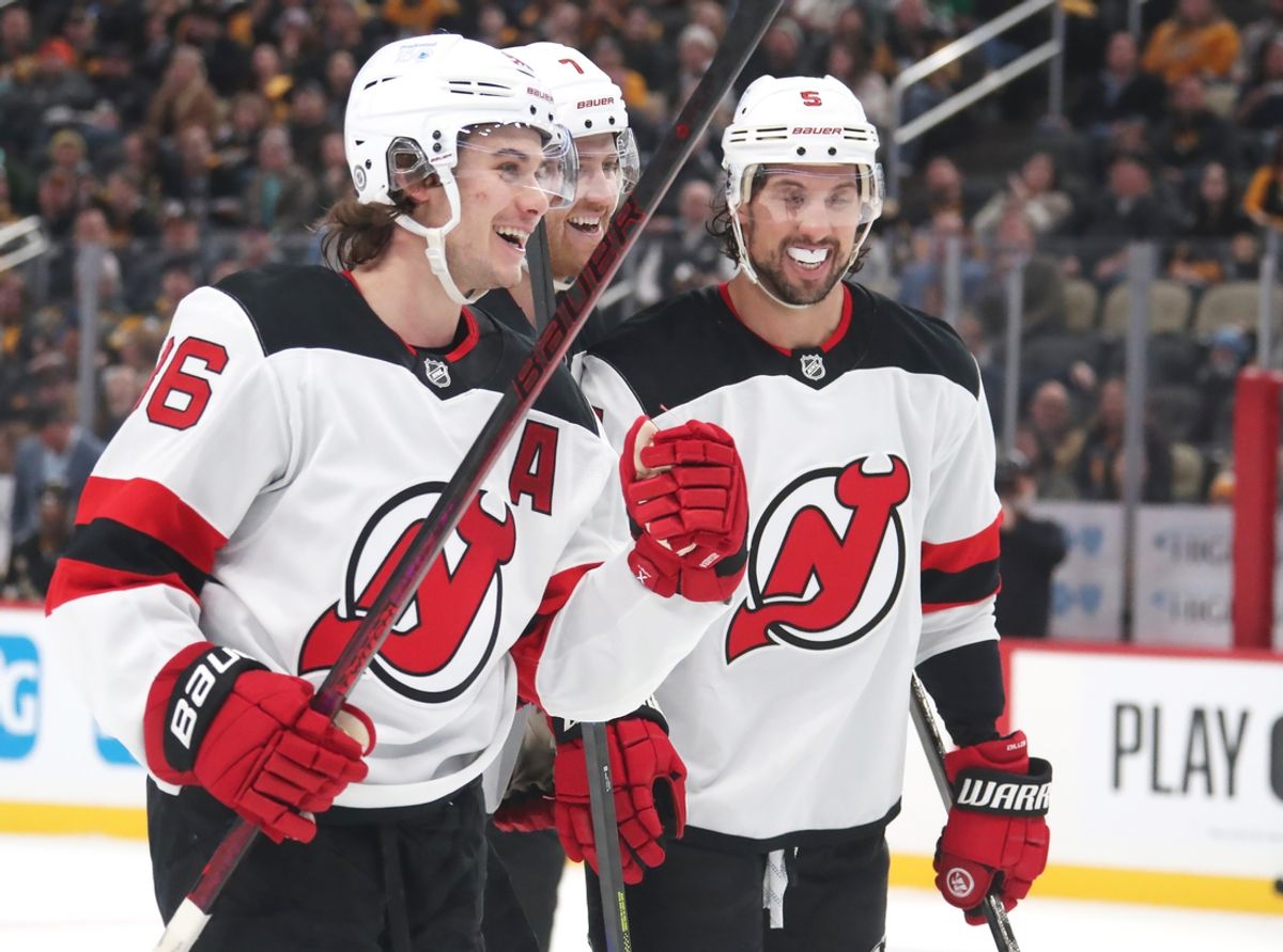 Feb 4, 2025; Pittsburgh, Pennsylvania, USA;  New Jersey Devils center Jack Hughes (86) celebrates his second goal of the game against the Pittsburgh Penguins during the second period at PPG Paints Arena. Mandatory Credit: Charles LeClaire-Imagn Images
