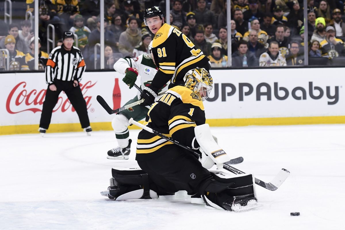 Feb 4, 2025; Boston, Massachusetts, USA; Boston Bruins goaltender Jeremy Swayman (1) makes a skate save during the second period against the Minnesota Wild at TD Garden. Mandatory Credit: Bob DeChiara-Imagn Images