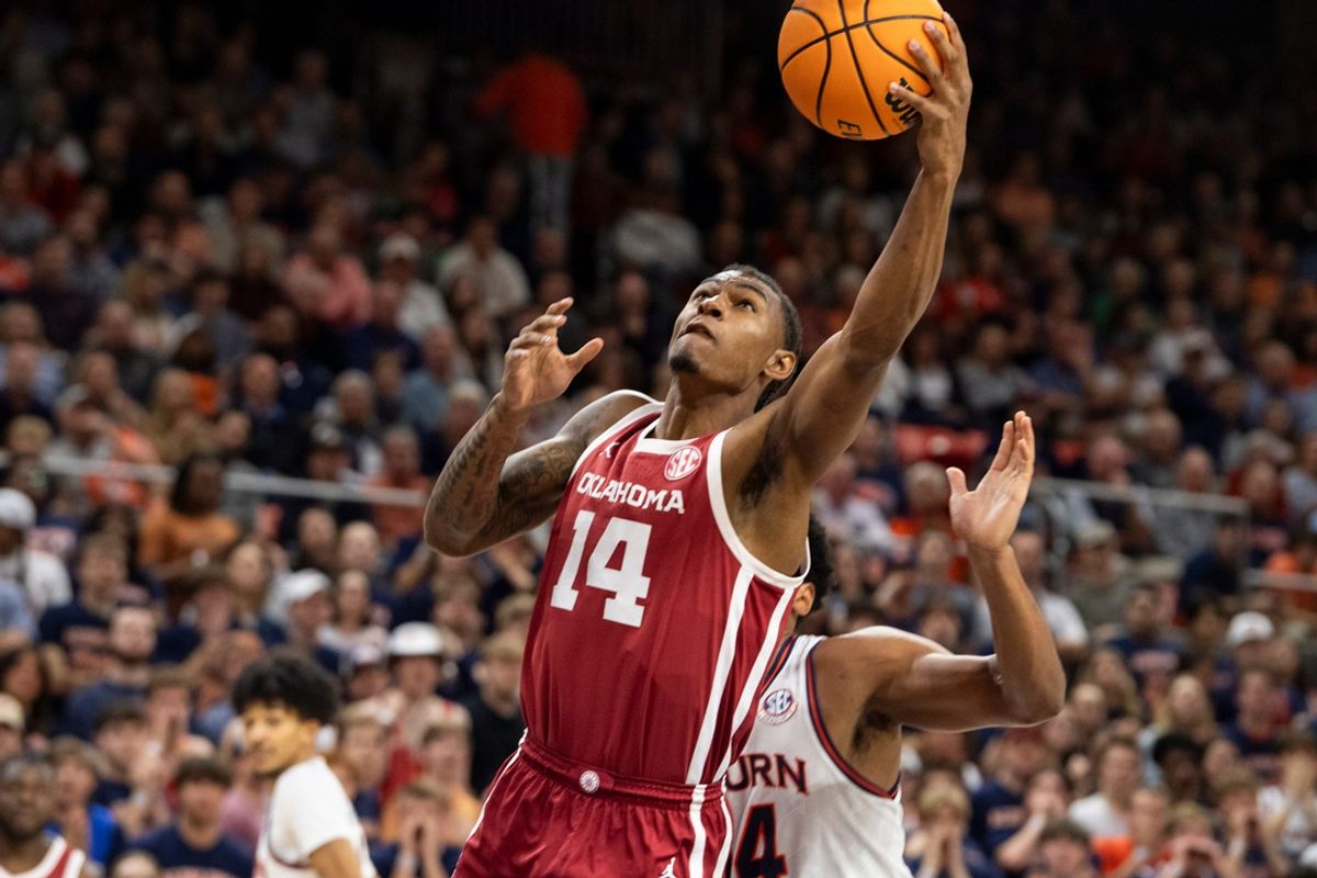 Oklahoma Sooners forward Jalon Moore (14) goes up for a layup as Auburn Tigers take on Oklahoma Sooners at Neville Arena in Auburn, Ala., on Tuesday, Feb. 4, 2025.