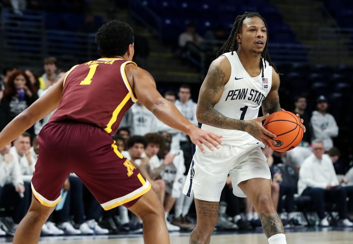 Feb 4, 2025; University Park, Pennsylvania, USA; Penn State Nittany Lions guard Ace Baldwin Jr (1) holds the ball as Minnesota Golden Gophers guard Isaac Asuma (1) defends during the first half at Bryce Jordan Center. Minnesota defeated Penn State 69-61. Mandatory Credit: Matthew O'Haren-Imagn Images