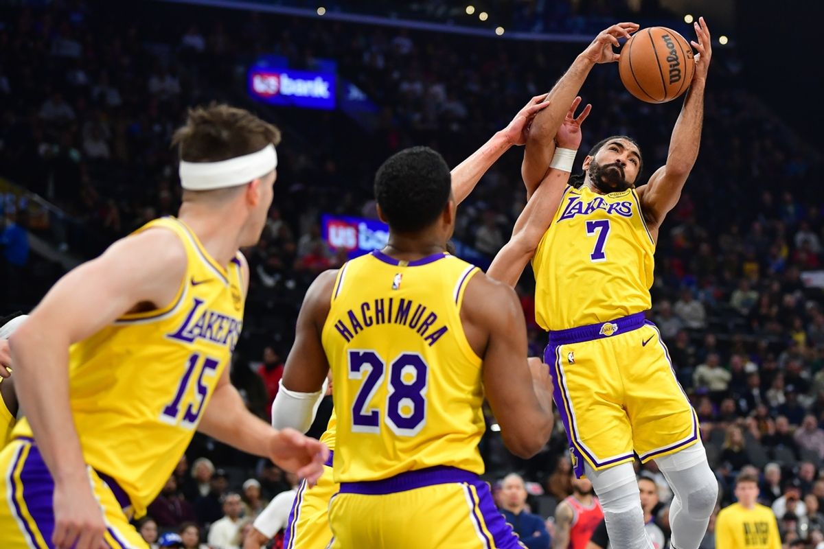 Feb 4, 2025; Inglewood, California, USA; Los Angeles Lakers guard Gabe Vincent (7) plays for the rebound against the Los Angeles Clippers during the first half at Intuit Dome. Mandatory Credit: Gary A. Vasquez-Imagn Images