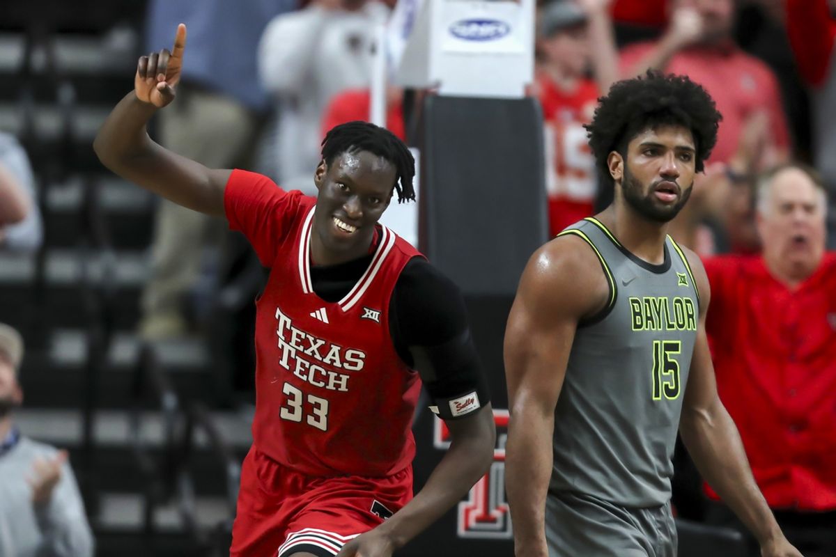 Feb 4, 2025; Lubbock, Texas, USA;  Texas Tech Red Raiders forward Federiko Federiko (33) reacts in the second half during the game against Baylor Bears forward Norchad Omier (15) in the second half at United Supermarkets Arena. Mandatory Credit: Michael C. Johnson-Imagn Images