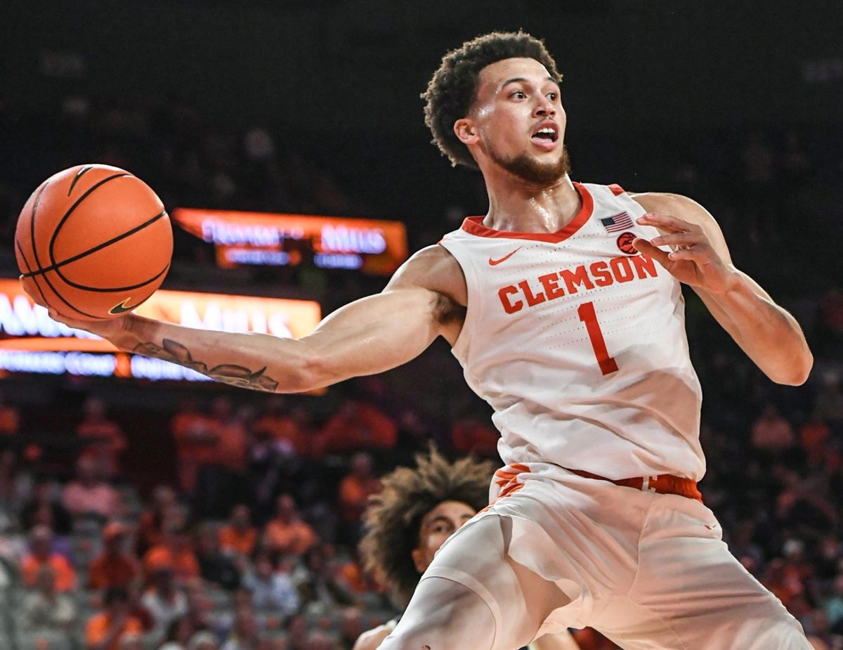 Clemson guard Chase Hunter (1) passes the ball playing Georgia Tech during the second overtime at Littlejohn Coliseum in Clemson, S.C. Tuesday, February 4, 2025.