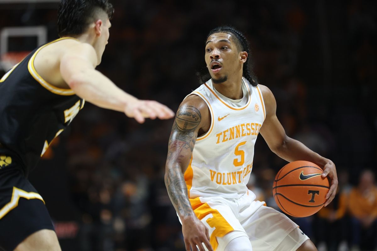 Feb 5, 2025; Knoxville, Tennessee, USA; Tennessee Volunteers guard Zakai Zeigler (5) moves the ball against the Missouri Tigers during the first half at Thompson-Boling Arena at Food City Center. Mandatory Credit: Randy Sartin-Imagn Images