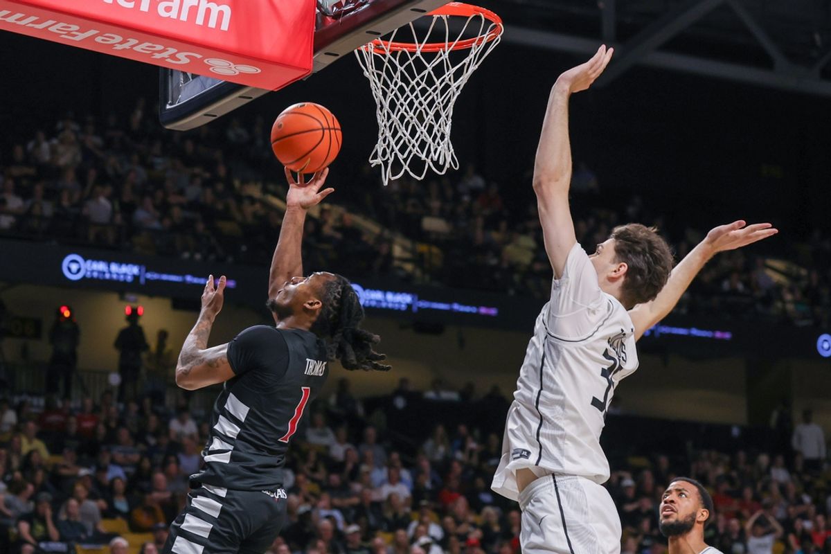 Feb 5, 2025; Orlando, Florida, USA; Cincinnati Bearcats guard Day Day Thomas (1) goes to the basket during the first half against the UCF Knights at Addition Financial Arena. Mandatory Credit: Mike Watters-Imagn Images