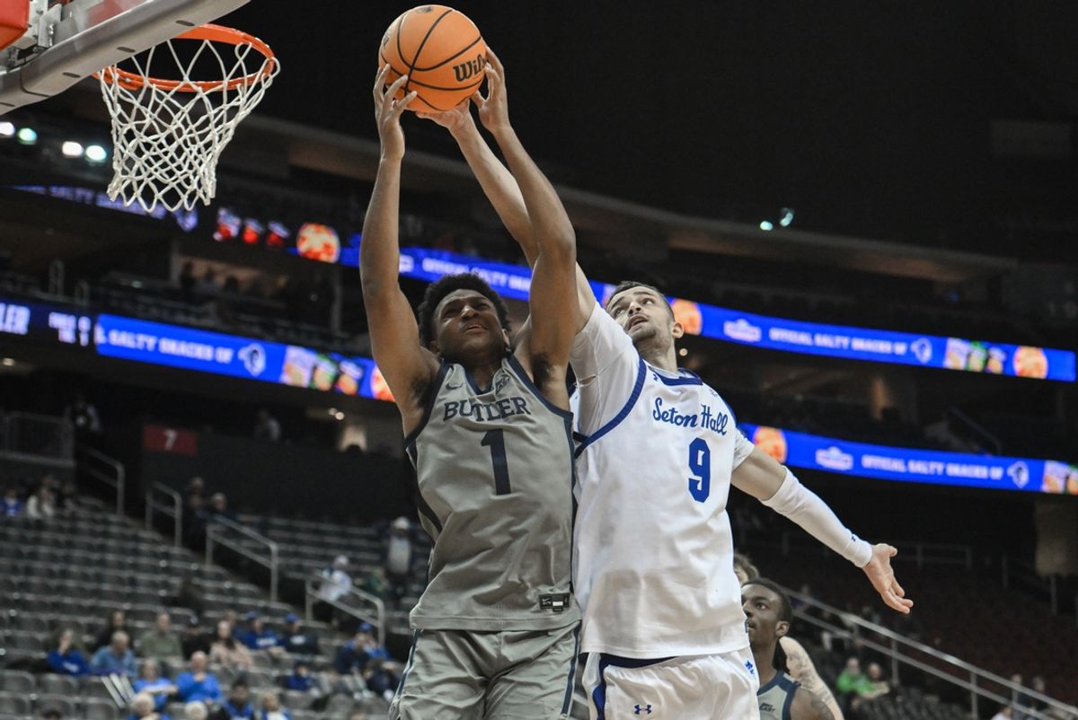 Feb 5, 2025; Newark, New Jersey, USA; Butler Bulldogs guard Evan Haywood (1) and Seton Hall Pirates forward Yacine Toumi (9) compete for a rebound during the second half at Prudential Center. Mandatory Credit: John Jones-Imagn Images