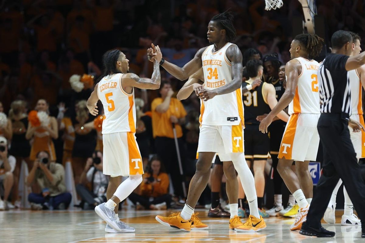 Feb 5, 2025; Knoxville, Tennessee, USA; Tennessee Volunteers guard Zakai Zeigler (5) and forward Felix Okpara (34) celebrate a play against the Missouri Tigers during the second half at Thompson-Boling Arena at Food City Center. Mandatory Credit: Randy Sartin-Imagn Images